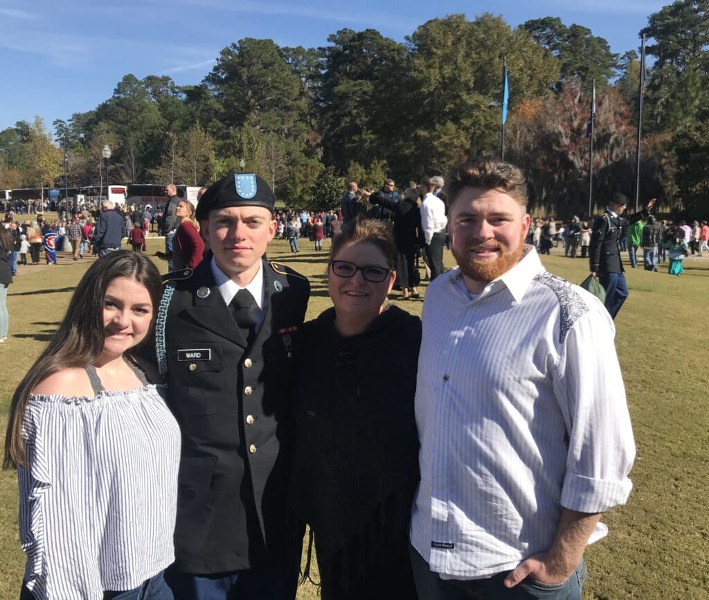 Monika is pictured here with her 3 children.