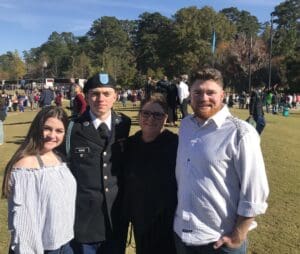 Monika is pictured here with her 3 children.